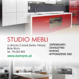 Nowoczesne meble kuchenne w Bydgoszczy. Białe szafki górne, czerwone dolne z piekarnikiem.  Na wyspie hoker. Reklama studia mebli.