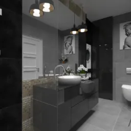 Wizualizacja nowoczesnej łazienki w odcieniach szarości i czerni z elementami mozaiki, okrągłą umywalką nablatową, wiszącą toaletą i dekoracyjnymi plakatami Marilyn Monroe.