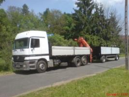 Transport ciężarowy i usługi budowlane.