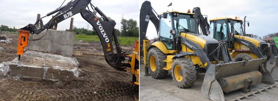 Żółta koparko-ładowarka Volvo z pomarańczowym młotem hydraulicznym rozbija betonowy element; w tle inne maszyny budowlane.