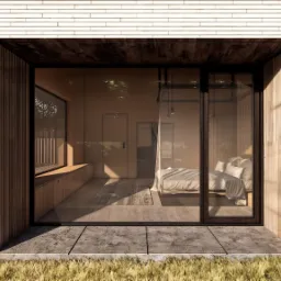 Wizualizacja sypialni w minimalistycznym domu z drewnianą elewacją, widoczna przez duże okno z czarną ramą. Wnętrze w odcieniach beżu, z ł&oacute;żkiem i wbudowanymi szafkami pod oknem. Na zewnątrz trawa...