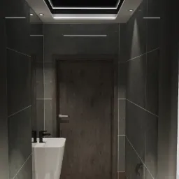 Wizualizacja łazienki w odcieniach szarości z umywalką o geometrycznym kształcie i czarną armaturą na tle ściany z płytek imitujących kamień, oświetlenie sufitowe wpuszczane.