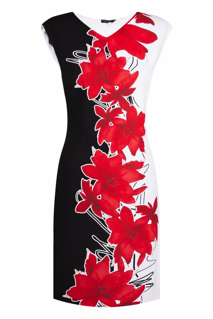 Elegancka, dopasowana sukienka w kolorze czarno-białym z motywem czerwonych kwiatów, prezentowana na jednolitym tle. Widoczne detale wzoru i krój sukienki.