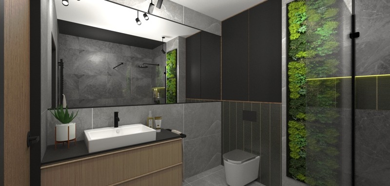 Nowoczesna łazienka z szarymi płytkami, drewnianą szafką pod umywalką z czarnym blatem, białym sedesem i pionową ścianą z zieleni, odbijającą się w dużym lustrze nad umywalką.