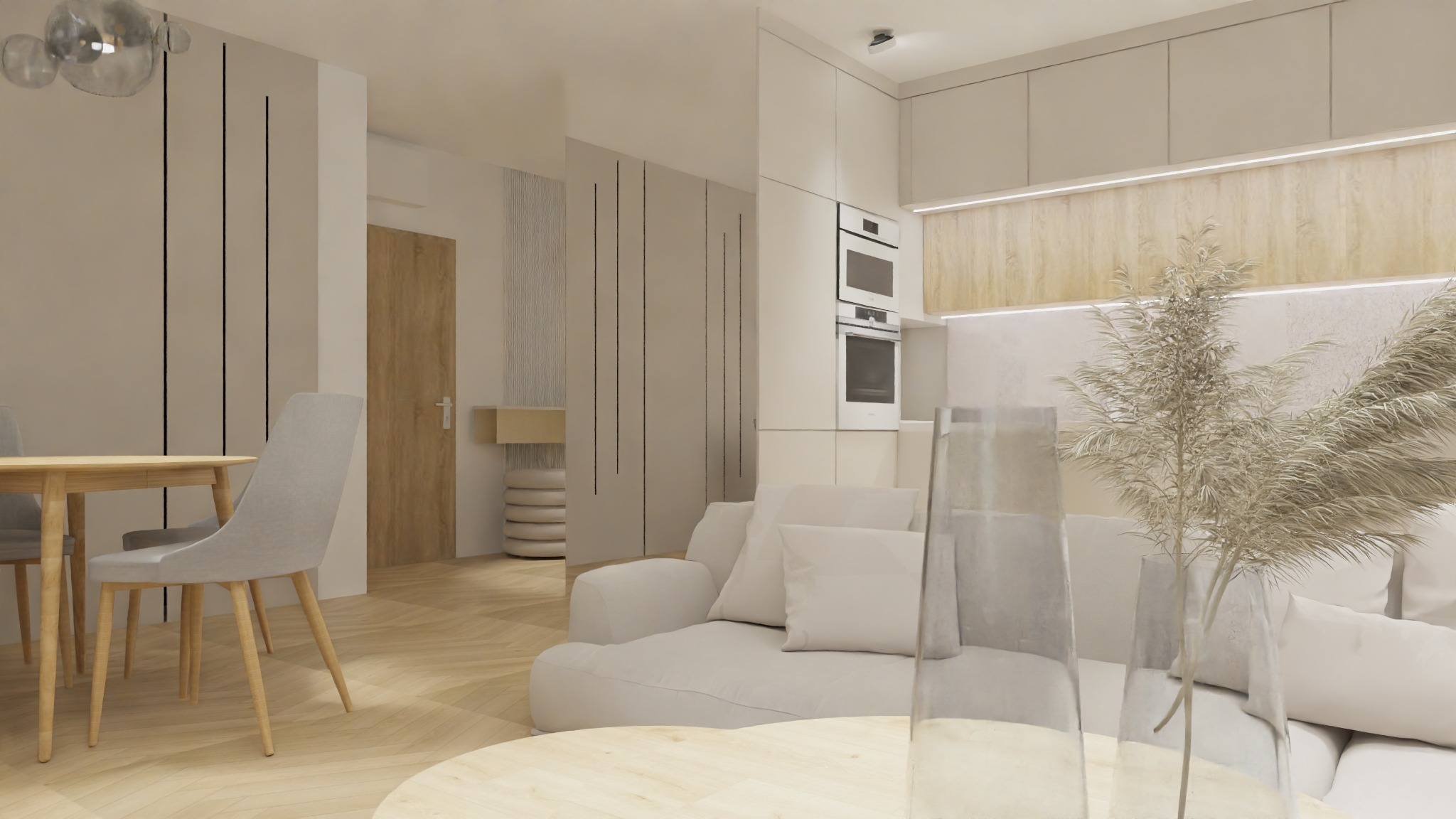 Jasne, minimalistyczne wnętrze z drewnianą podłogą i meblami w odcieniach bieli i szarości. Widoczny stół z krzesłami, sofa z poduszkami oraz zabudowa kuchenna z piekarnikiem. Na pierwszym planie...