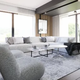 Nowoczesny salon z szarym narożnikiem, marmurowym stolikiem kawowym i fotelem typu boucle, oświetlony naturalnym światłem z dużych okien, z dekoracyjną ścianą z drewnianych lameli...