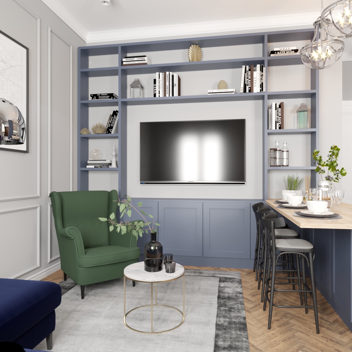 Wnętrze salonu z biblioteczką w zabudowie, telewizorem, zielonym fotelem typu uszak, stolikiem kawowym z marmurowym blatem i wysokim blatem barowym z krzesłami, oświetlonym dekoracyjnym żyrandolem.