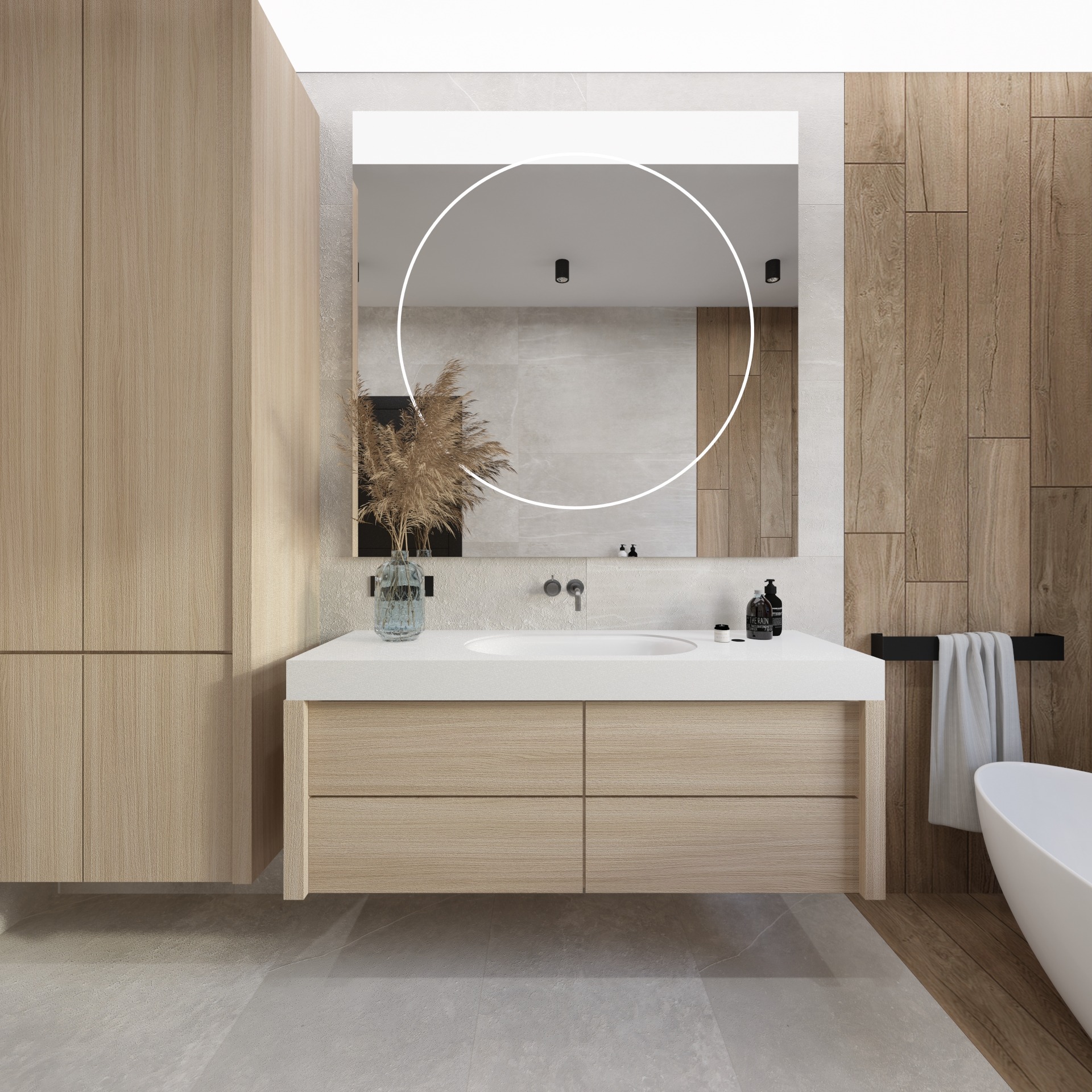 Nowoczesna łazienka z drewnianymi akcentami: szafka pod umywalką, wysoka szafa, okrągłe lustro z podświetleniem i drewniana ściana. Minimalizm i elegancja.