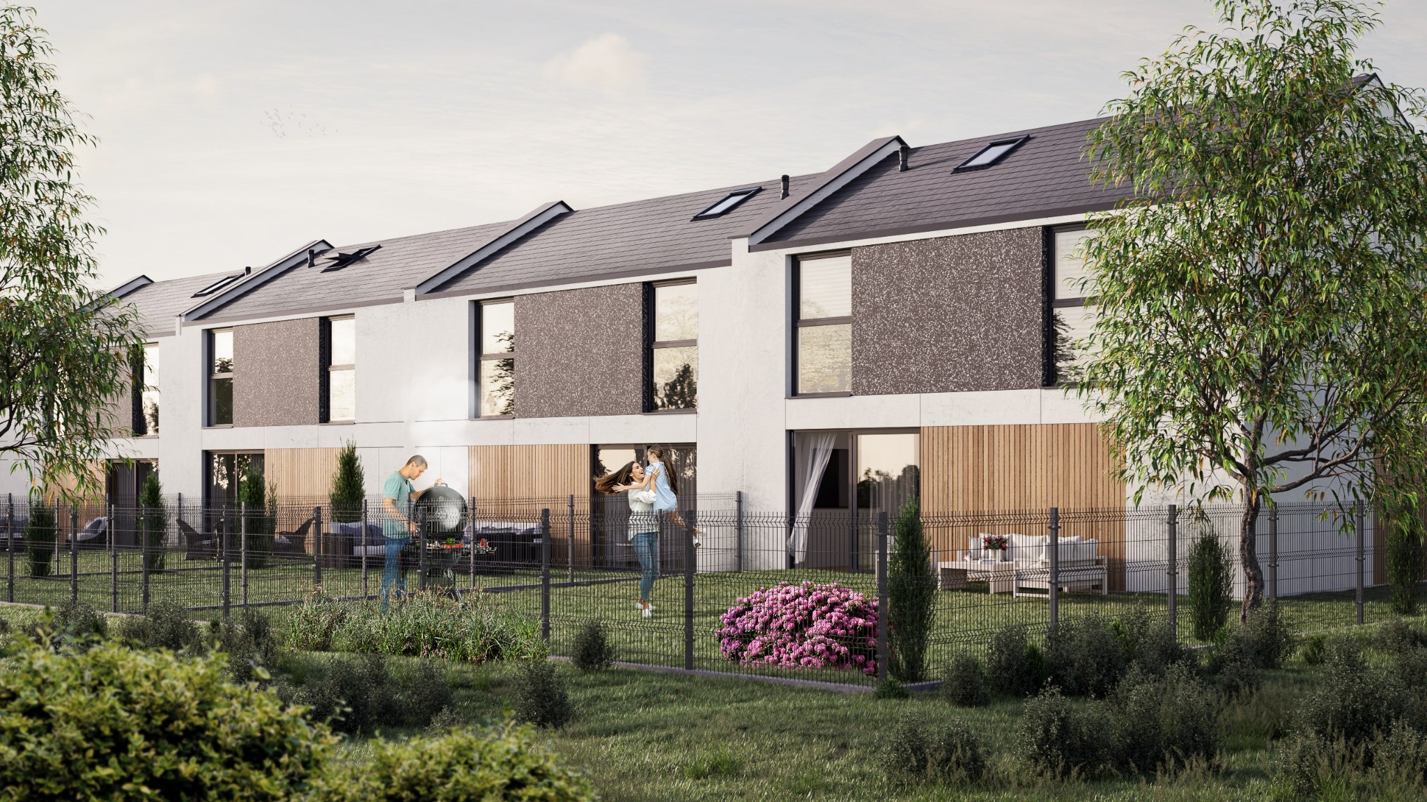 Wizualizacja szeregu nowoczesnych domów z płaskimi dachami i elewacją łączącą biel, szarość i drewno, z niskim ogrodzeniem metalowym, gdzie w jednym z ogródków mężczyzna grilluje, a w innym kobieta...