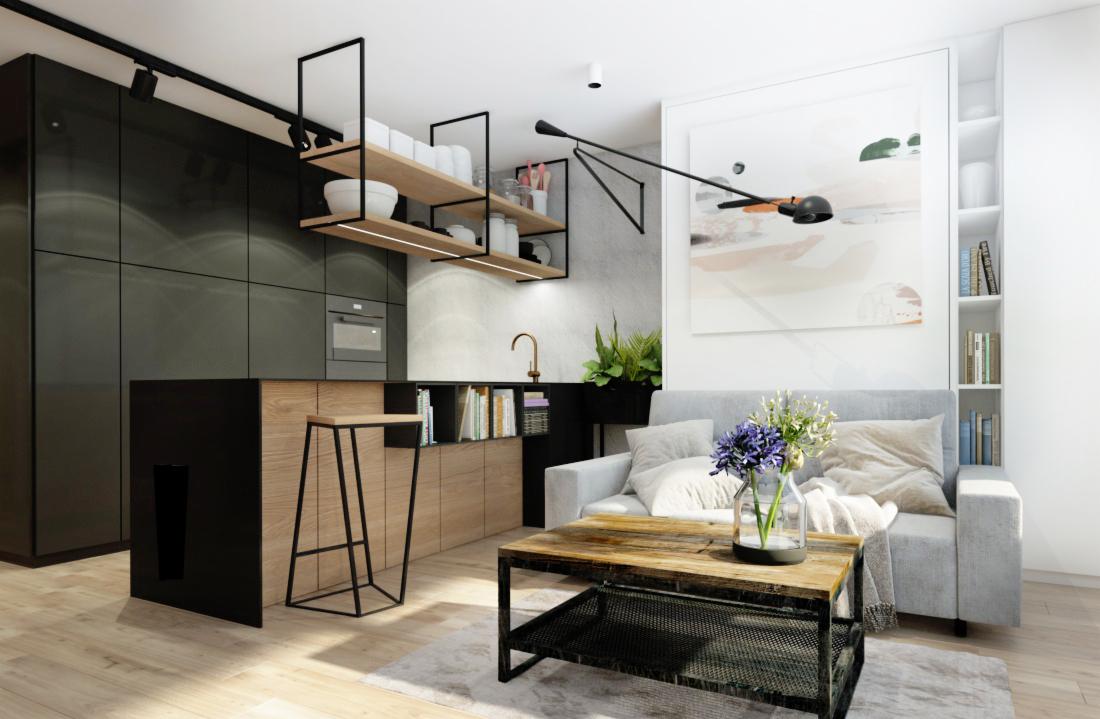 Nowoczesne wnętrze: połączenie kuchni z salonem, czarne szafki kuchenne, drewniany blat, wysoki stołek barowy, szare ściany, półki z oświetleniem, szara sofa, stolik kawowy z metalową siatką...