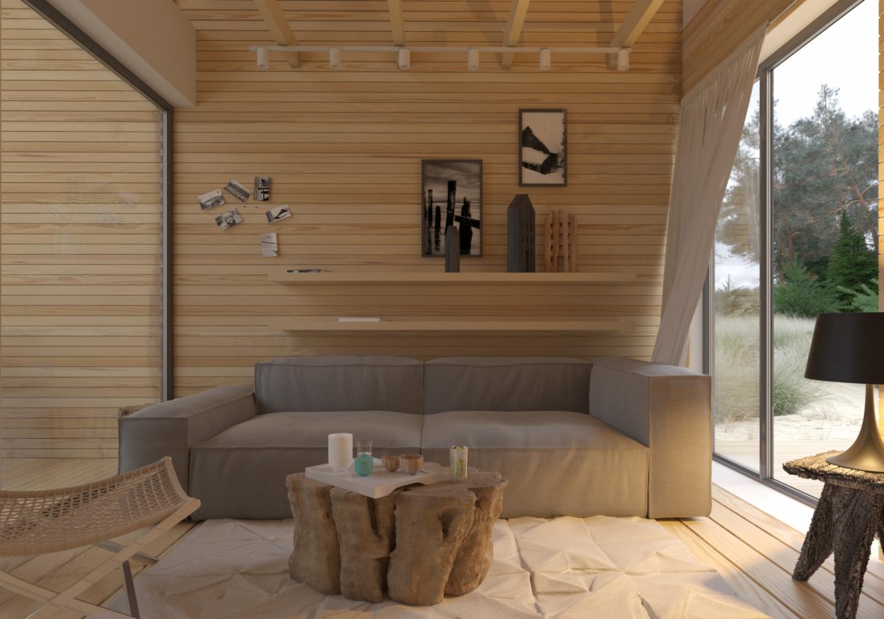 Wnętrze domu z drewnianymi ścianami, szarą sofą, stolikiem kawowym z pnia drzewa i widokiem na las za oknem.