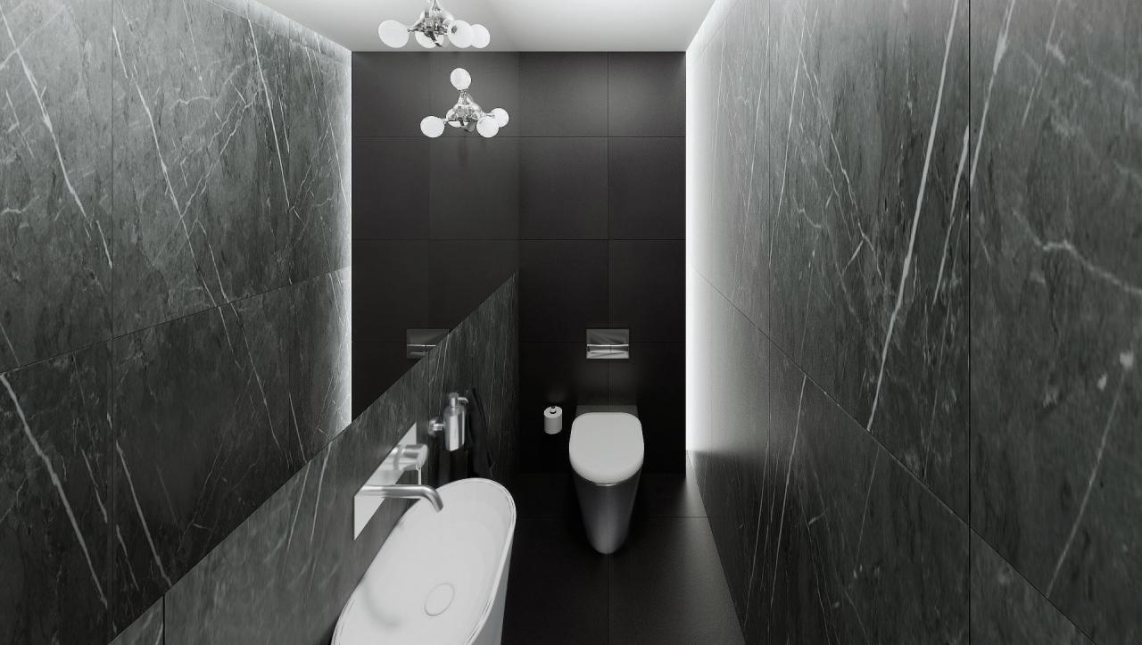 Nowoczesna łazienka w Poznaniu z czarnymi płytkami imitującymi marmur na ścianach, owalną białą umywalką i wiszącą toaletą, oświetlona designerską lampą sufitową.