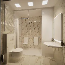 Jasna łazienka z marmurowymi płytkami, szklaną kabiną prysznicową i podwieszaną toaletą. Uwagę przykuwa podświetlane lustro i mozaika na ścianie kabiny.