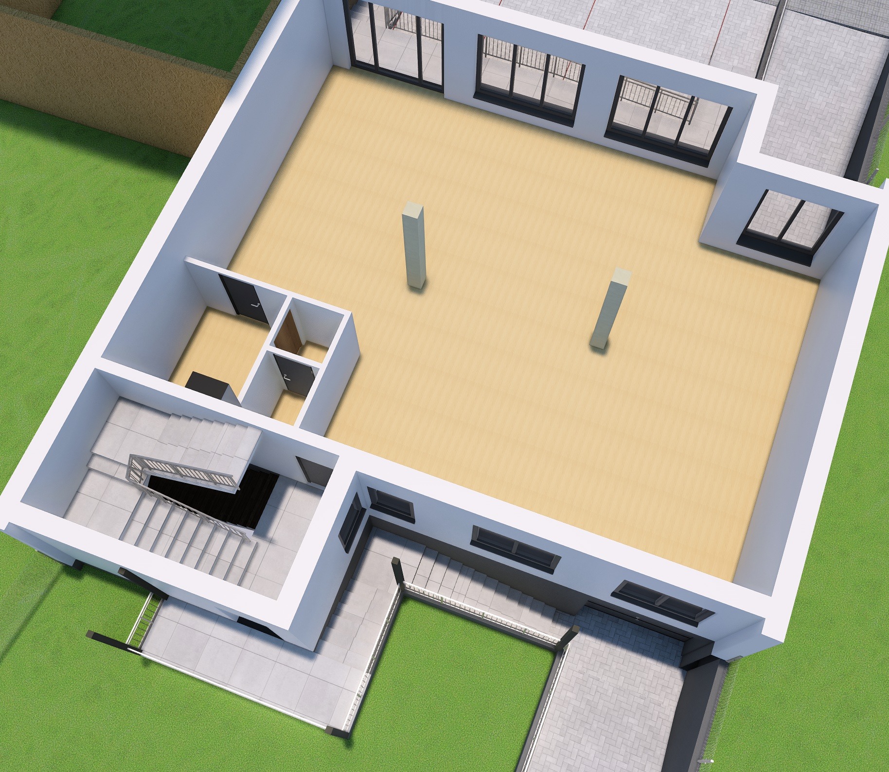 Wizualizacja 3D przekroju poprzecznego budynku z widocznymi schodami, oknami i dwoma filarami w pustym pomieszczeniu na parterze, otoczona trawnikiem i fragmentem tarasu.