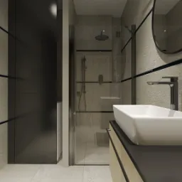 Nowoczesna łazienka z kabiną prysznicową typu walk-in, umywalką nablatową o geometrycznym kształcie i okrągłym lustrem, wykończona płytkami w odcieniach szarości z czarnymi akcentami.