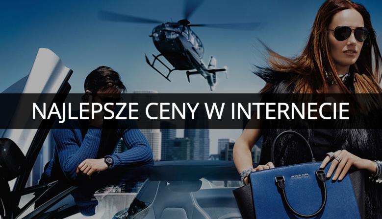 Mężczyzna w sportowym samochodzie z otwartymi drzwiami, kobieta z torebką Michael Kors, helikopter w tle, miejski krajobraz, hasło reklamowe 'Najlepsze ceny w Internecie'.
