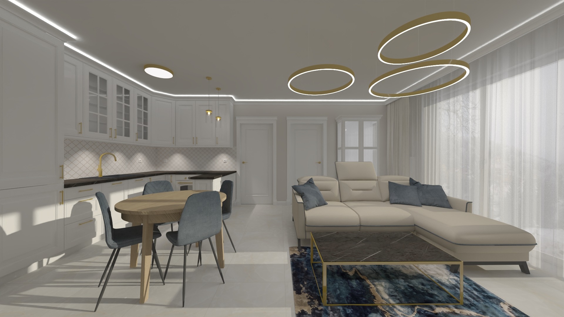 Wnętrze otwartej przestrzeni: biała zabudowa kuchenna z czarnym blatem i złotą armaturą, okrągły drewniany stół z szarymi krzesłami, beżowa sofa z niebieskimi poduszkami, stolik kawowy z marmurowym...