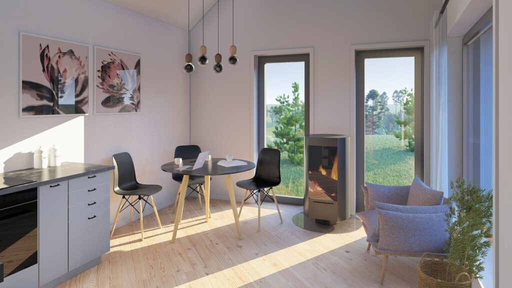 Jasne wnętrze domu w Ciechocinku z minimalistyczną kuchnią, okrągłym stołem z czarnymi krzesłami, kominkiem i widokiem na ogród przez duże okna.