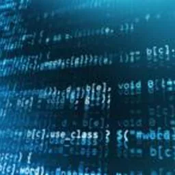 Ekran komputera wyświetlający kod programu w odcieniach niebieskiego, z widocznymi fragmentami składni i struktur programistycznych.