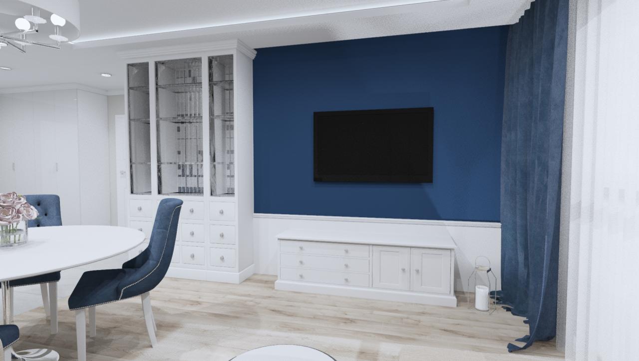 Wizualizacja wnętrza: granatowa ściana z telewizorem, białe meble (witryna, komoda), okrągły stół z niebieskimi krzesłami, zasłona w odcieniach niebieskiego, jasna podłoga i oświetlenie.