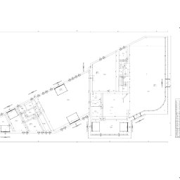 Grupa iArchitekci.pl - Plan architektoniczny parteru budynku z wymiarami pomieszczeń, w tym warsztatów i biur, z zaznaczonymi wjazdami i wyjazdami. Czytelny rysunek techniczny z opisami.