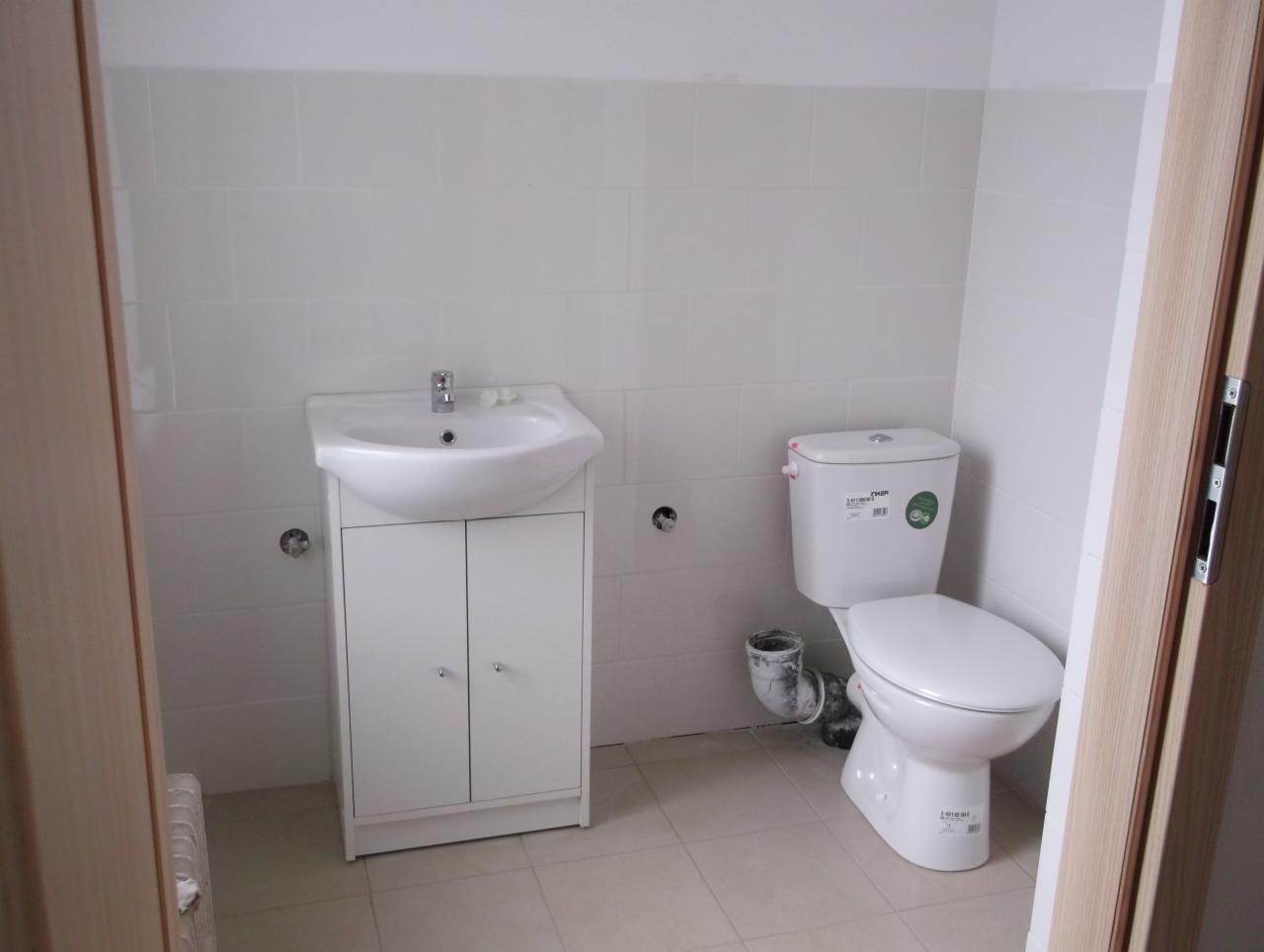 Układanie glazury - Salon fryzjerski (toaleta)