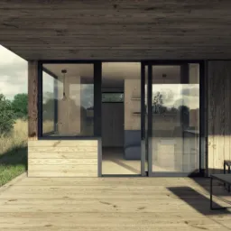 Nowoczesny dom letniskowy z drewnianą elewacją i dużymi oknami przesuwnymi, otoczony łąką. Widoczny fragment wnętrza z minimalistycznym wyposażeniem i wiszącą lampą. Na tarasie proste, metalowe ławki.
