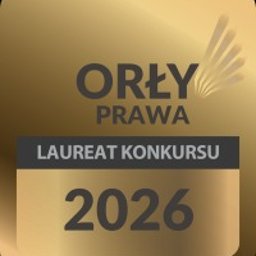 Kancelaria Adwokacka Marcin Sołub - Złota statuetka 'Orły Prawa - Laureat Konkursu 2026' na ciemnym tle. Nagroda prawnicza z wyraźnym rokiem.