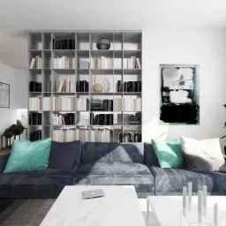 Jasne, minimalistyczne wnętrze salonu z dużą, modułową sofą w odcieniach szarości, turkusowymi poduszkami, białą marmurową ławą z laptopem, wysokim regałem na książki i abstrakcyjnym obrazem...