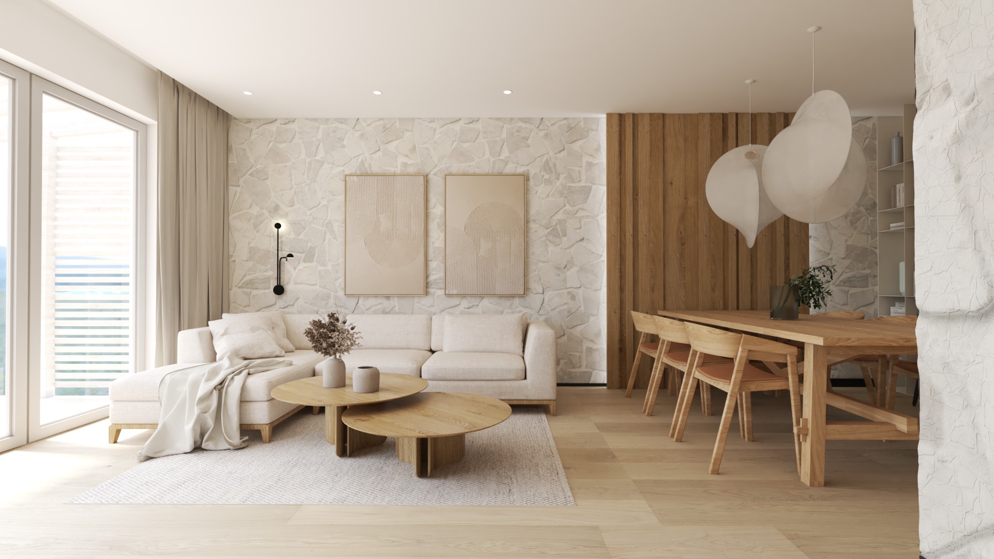 Jasne wnętrze: sofa z narzutą, stoliki kawowe, stół z krzesłami, kamienna ściana z grafikami, drewniane panele i designerskie lampy wiszące.