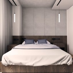 Egad - Minimalistyczna sypialnia z drewnianym łóżkiem, betonowymi panelami ściennymi i wiszącymi lampami tubowymi.
