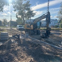 CUDEX - Warszawa - Janki - koparka na systemie 3D sterowana za pośrednictwem tachimetru