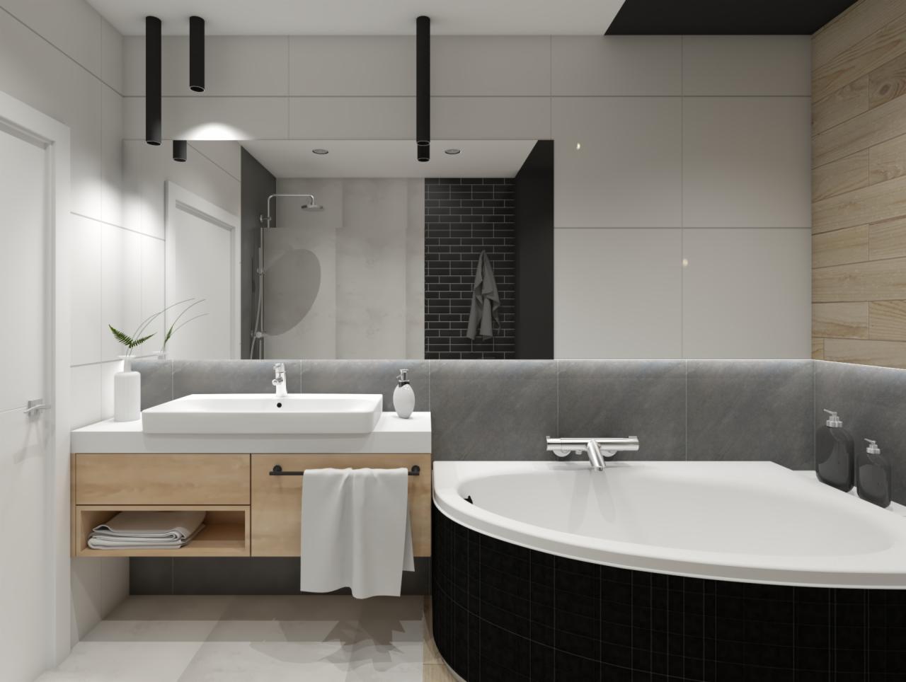 Nowoczesna łazienka z białą umywalką nablatową, drewnianą szafką pod umywalką z ręcznikiem, narożną wanną obłożoną czarną mozaiką, szarymi płytkami na ścianach i drewnianymi panelami, widokiem...