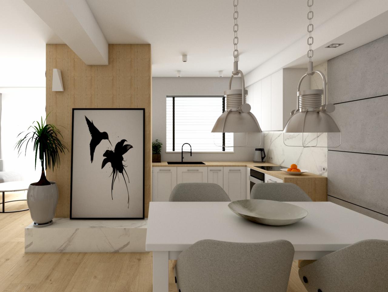 Nowoczesna kuchnia z białymi szafkami, drewnianym blatem, marmurowym backsplash'em i betonową ścianą, oświetlona dwoma metalowymi lampami wiszącymi nad białym stołem z szarymi krzesłami.