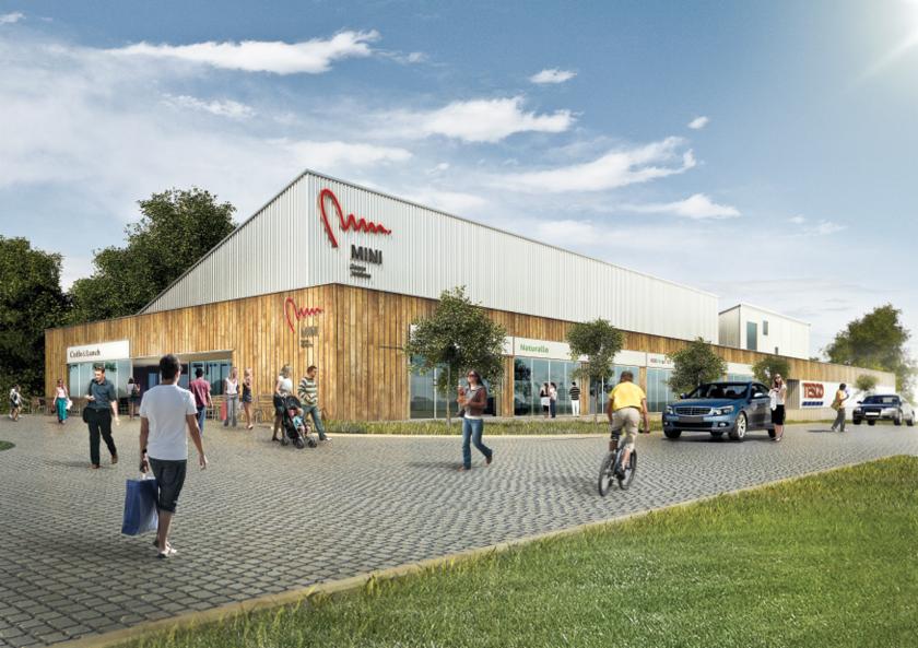 Wizualizacja budynku usługowego z drewnianą fasadą i białym dachem, z logo 'Mimi' w kolorze czerwonym, otoczonego zielenią i przechodniami, z widocznymi sklepami 'Coffee Lunch' i 'Naturalie'.