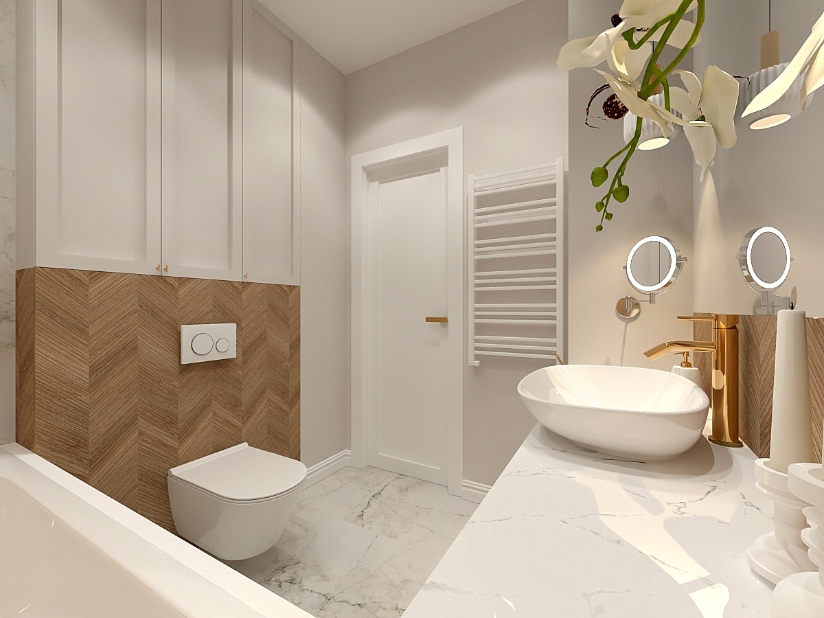 Elegancka łazienka w Warszawie z marmurową posadzką i blatem, owalną umywalką, złotą armaturą oraz ścianą wykończoną drewnem w jodełkę, uzupełniona o białe szafki i dekoracyjny grzejnik.