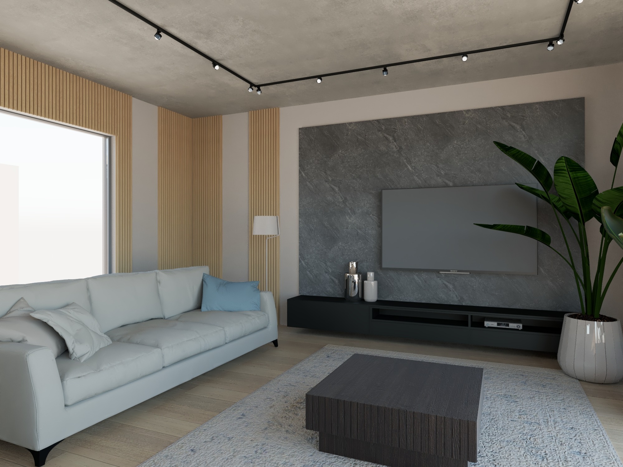 Nowoczesny salon z szarą ścianą z efektem kamienia, białą sofą z błękitną poduszką, drewnianymi panelami ściennymi, czarną szafką RTV i rośliną w białej donicy.