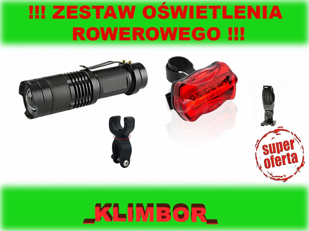 Zestaw rowerowy: przednia czarna latarka taktyczna z klipsem, czerwona lampka tylna z gumowym paskiem mocującym i uchwyt na kierownicę, promocyjna naklejka 'Super oferta' i logo 'KLIMBOR'.