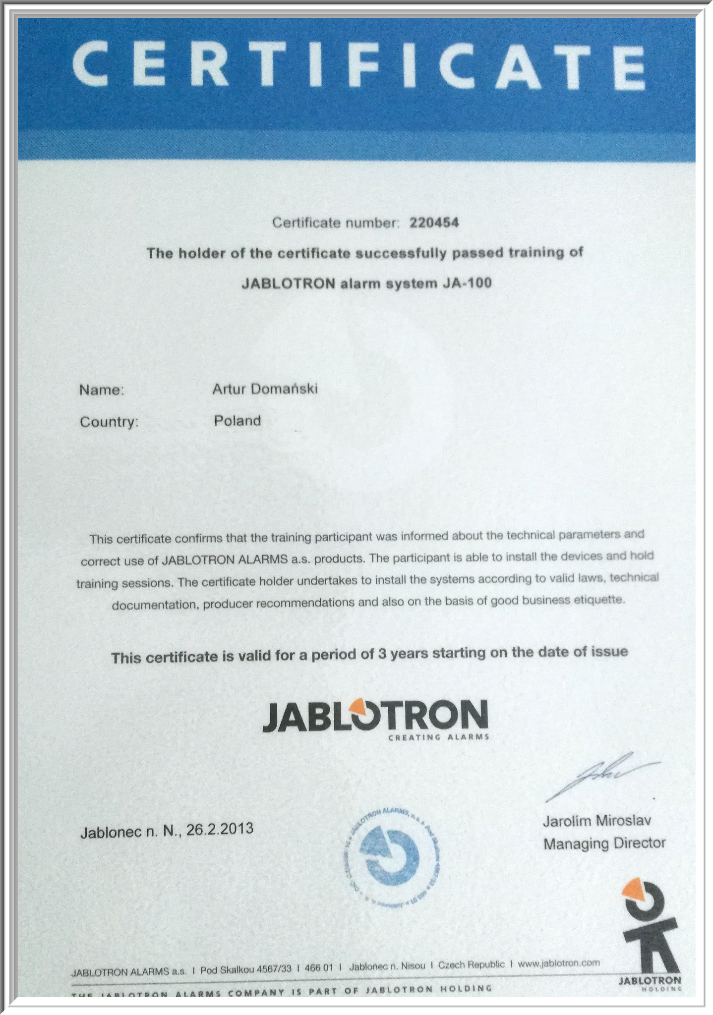 Certyfikat ukończenia szkolenia z zakresu systemów alarmowych Jablotron JA-100 dla Artura Domańskiego z Polski, wydany 26.02.2013.