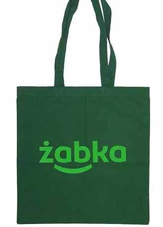 Zielona torba materiałowa z nadrukowanym logo 'żabka'.