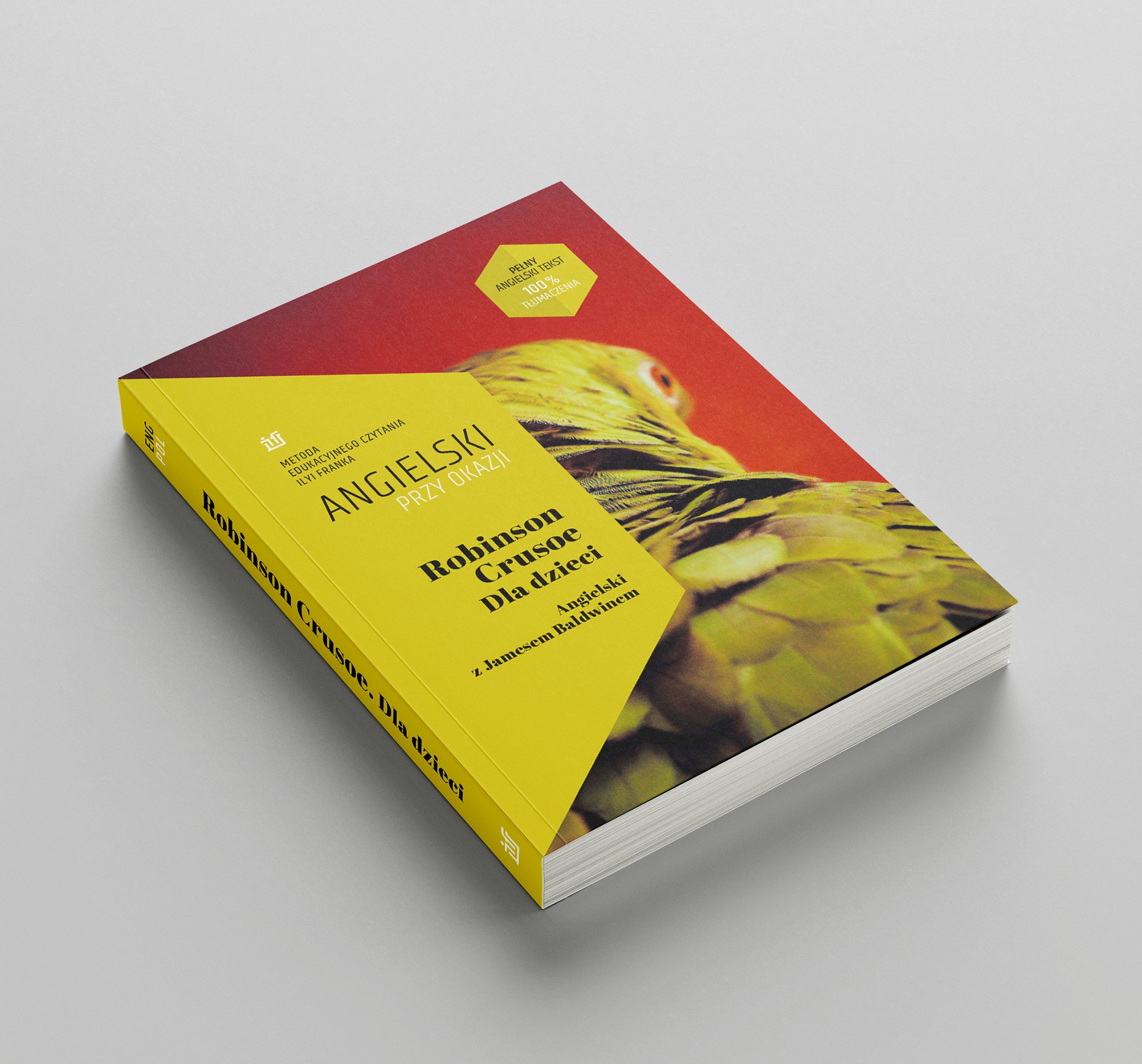 Żółto-czerwona okładka książki do nauki angielskiego dla dzieci 'Robinson Crusoe' z ilustracją papugi, leżąca na szarym tle.
