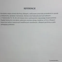 Skan dokumentu referencyjnego dla firmy Liftexpert z Zielonej Góry, potwierdzającego profesjonalny montaż wind hydraulicznych.