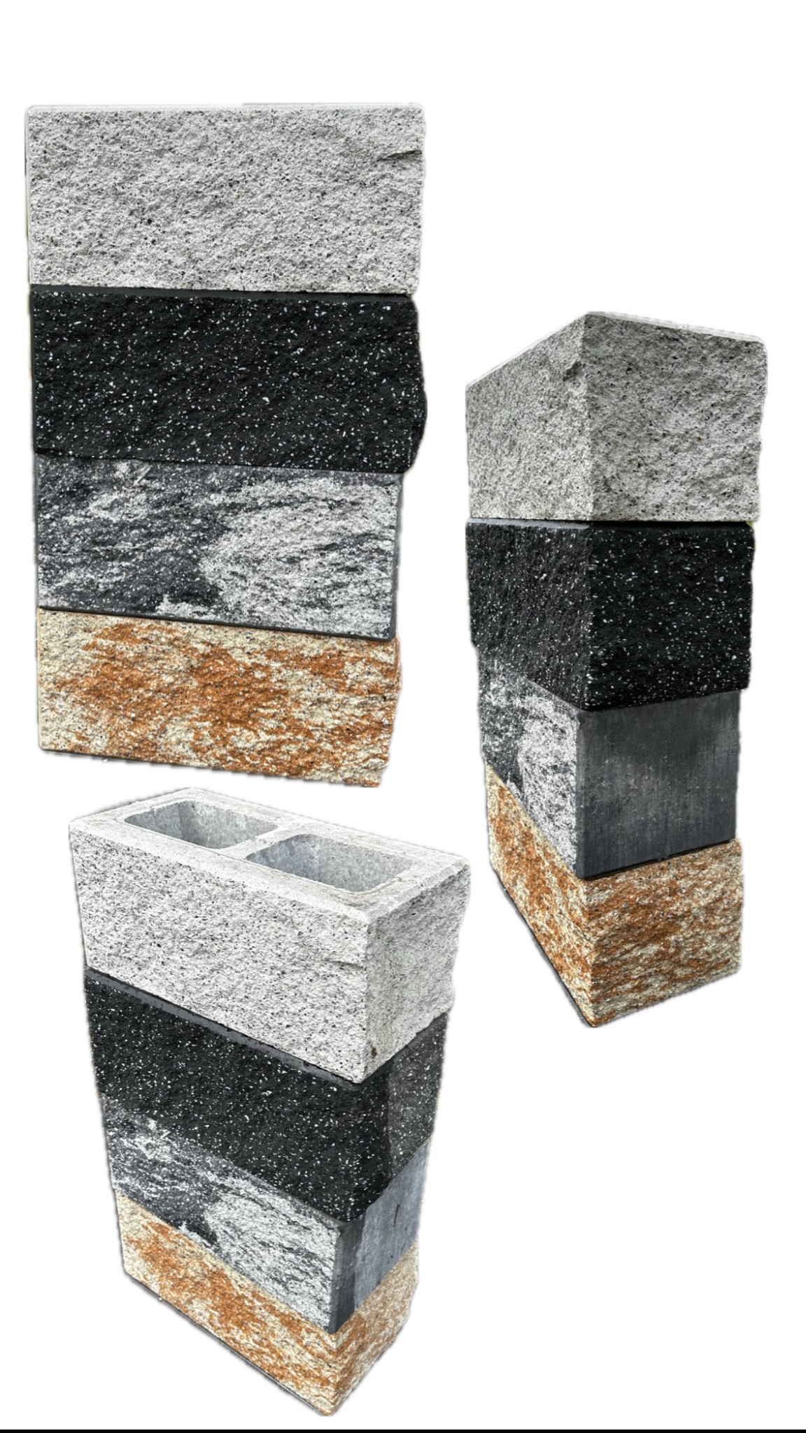 Prezentacja różnokolorowych kostek granitowych ułożonych w stosy, ukazujących fakturę i barwę materiału na białym tle.