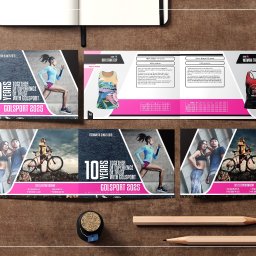 Golden Cat Studio - Otwarty katalog produktowy firmy Golsport 2025 prezentujący odzież sportową damską i męską, w tym tank topy z nadrukami, wraz ze specyfikacją materiałową i tabelą rozmiarów, na tle drewnianego...