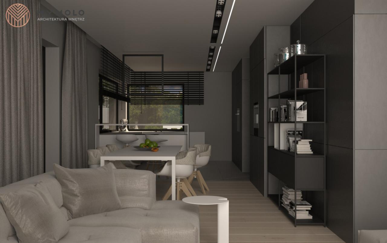 Wizualizacja wnętrza: salon z sofą w odcieniach szarości, jadalnia z białym stołem i krzesłami, kuchnia z czarnymi szafkami i otwartą półką z książkami i dekoracjami. Widoczne logo architekta...