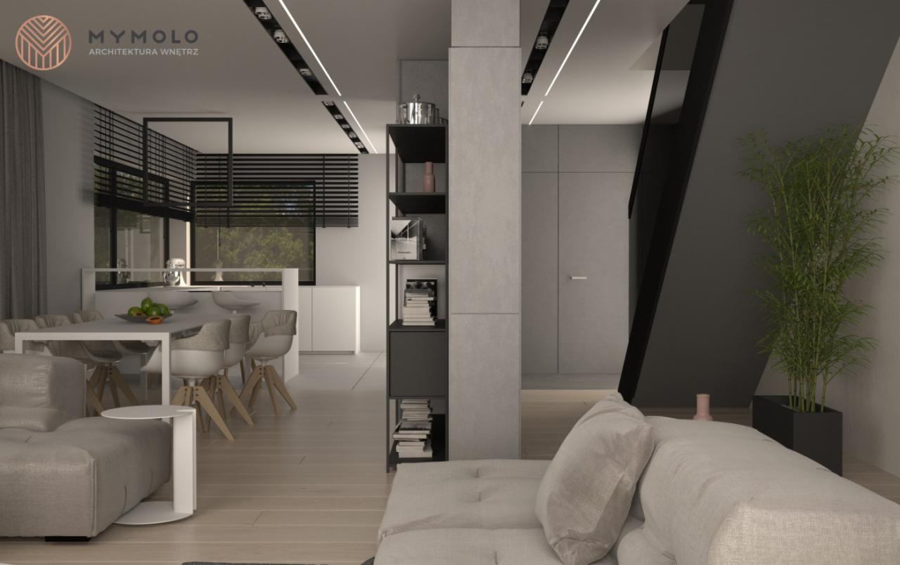 Jasne wnętrze domu z sofą, stołem jadalnym, kuchnią w tle, regałem i schodami, oświetlone ledowymi lampami sufitowymi.