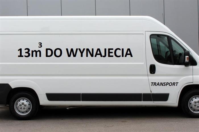 Biały samochód dostawczy z napisem '13m3 DO WYNAJĘCIA' i 'TRANSPORT' na boku.