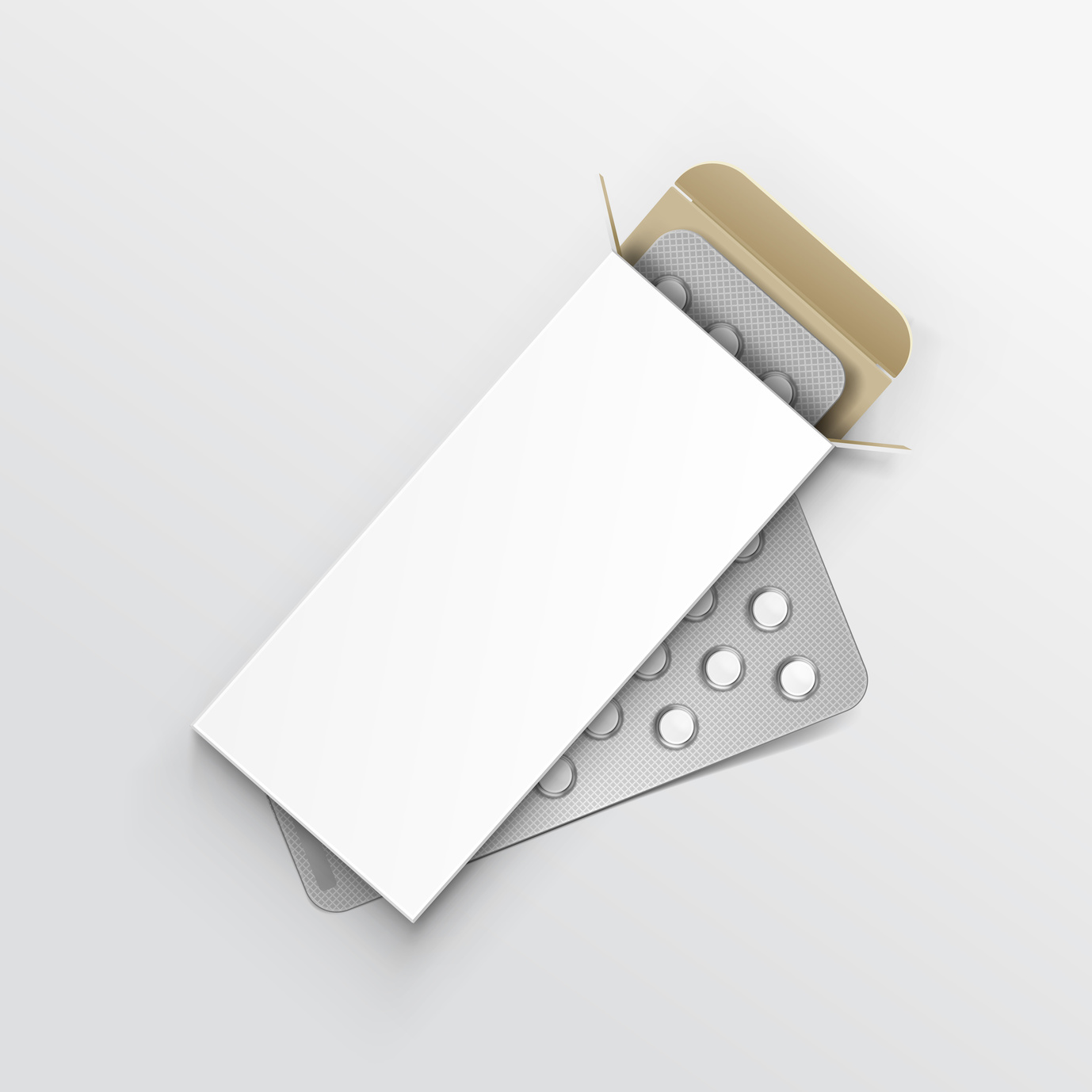 Dwa blistry tabletek w srebrnych opakowaniach umieszczone w otwartym, białym kartonowym pudełku z beżowym wnętrzem, leżące na jasnoszarym tle.