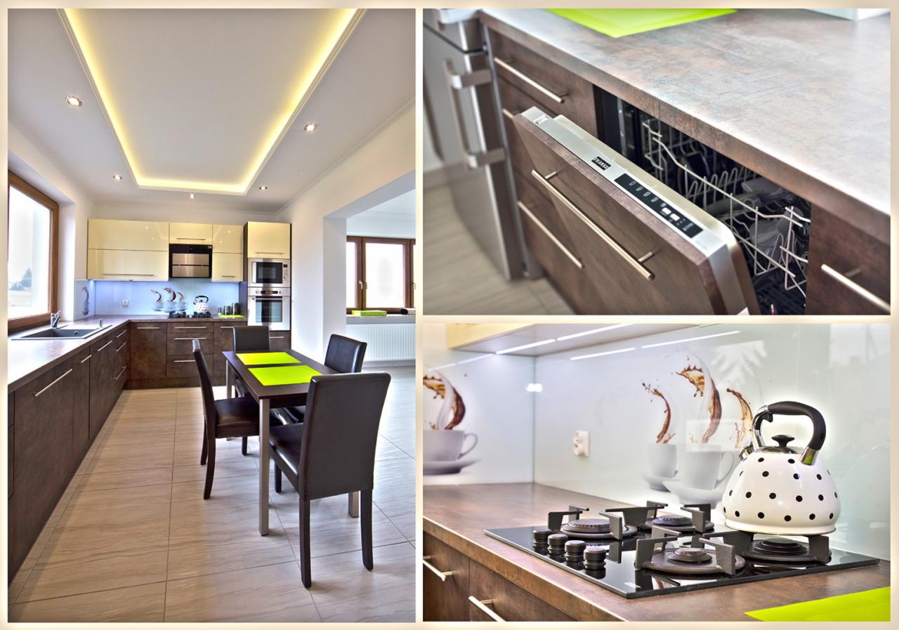 Nowoczesna kuchnia w brązach i beżach, z podświetlanym sufitem, płytą grzewczą z czajnikiem w kropki i otwartą zmywarką z drewnianym frontem.