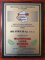 Dyplom Wojewódzki Lider Biznesu 2016 dla AG ITECH Sp. z o.o., w ramce z ciemnego drewna, z elementami graficznymi w kolorze złotym i czarnym.